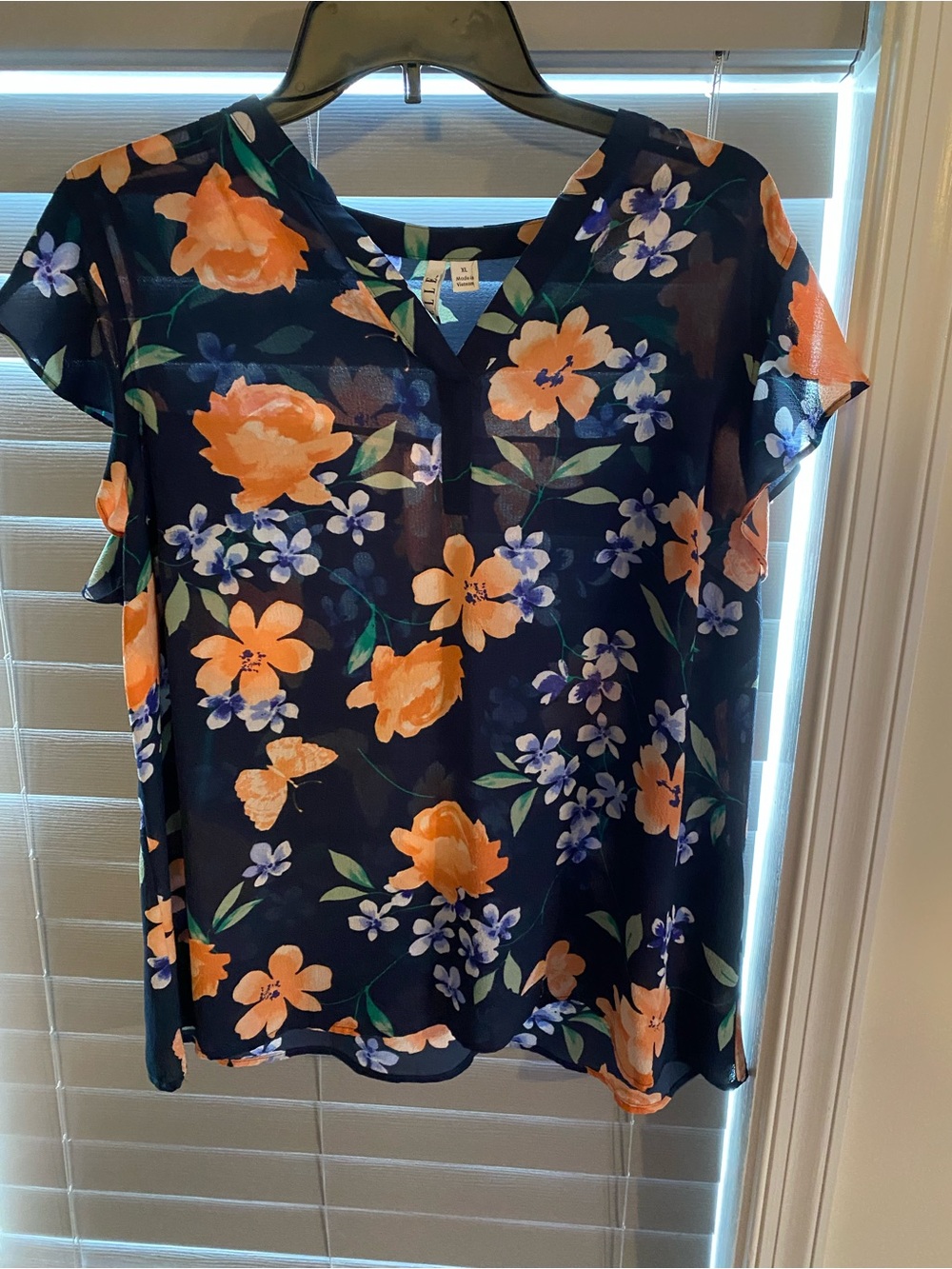 Elle Navy V-Neck Floral Blouse with Orange & Blue Flowers